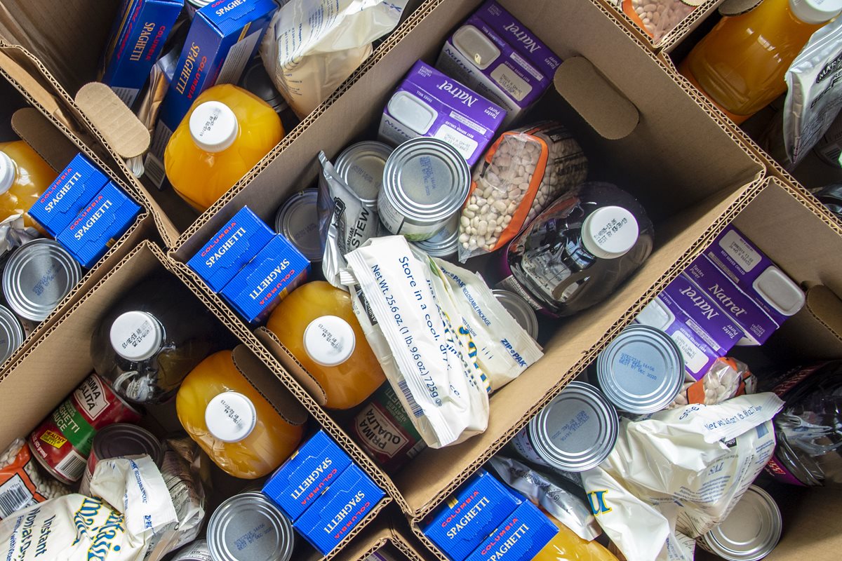 Cardboard boxes filled with food supplies