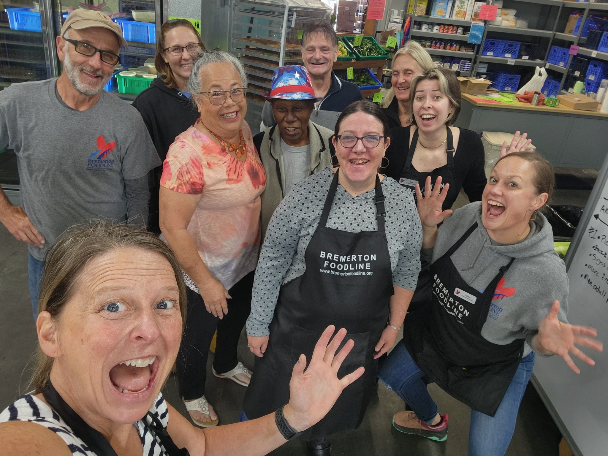 Bremerton Foodline volunteers gathered in the warehouse